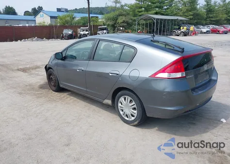 2010 Honda Insight Lx z USA, uszkodzony, nr VIN JHMZE2H58AS019727